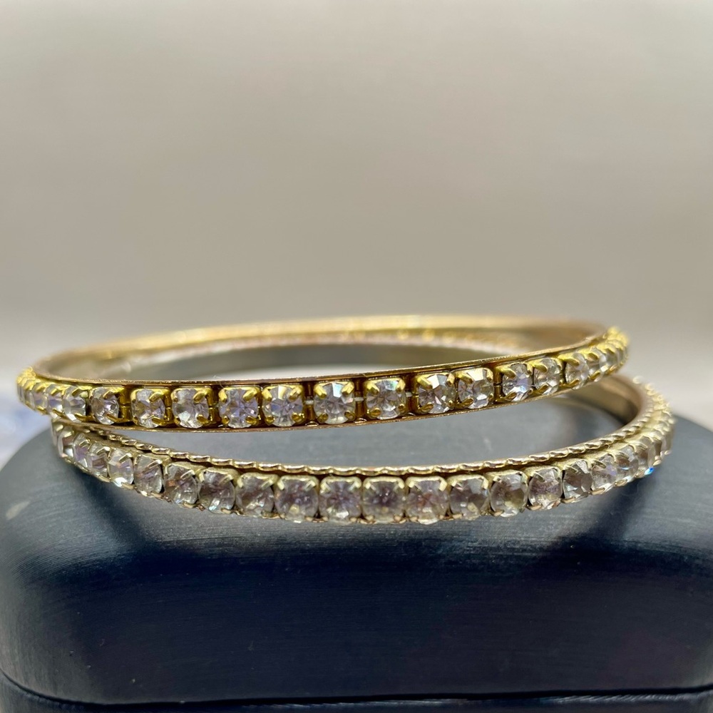 Vintage 2 rhinestone bangle bracelets. Gold tone and silver tone bases. Glam